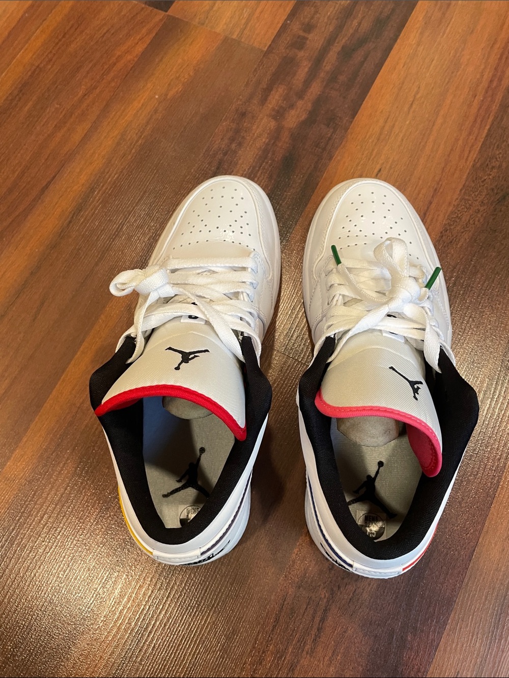 Jordan Men’s White Low-Top Sneakers with Black and Red Accents
